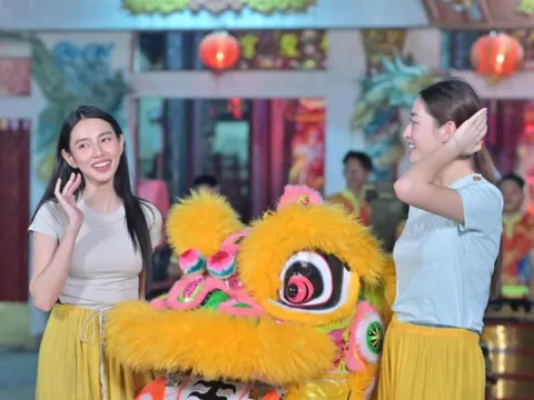 Hoa hậu Thùy Tiên và Lương Thùy Linh "nhập môn" múa lân sư rồng