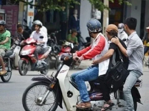 Chở người say rượu bằng xe máy, có người ngồi sau giữ, liệu có bị phạt?