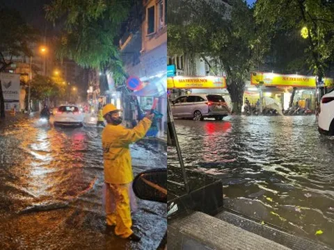 Ảnh, clip: Hà Nội mưa như trút nước tối cuối tuần, người dân bì bõm di chuyển khó khăn